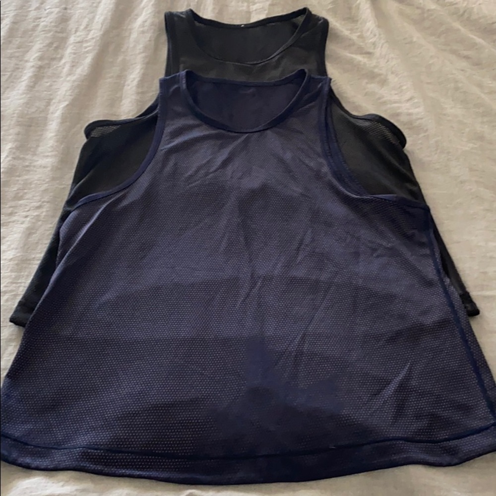 Like new. Jersey tanks. Size 4.